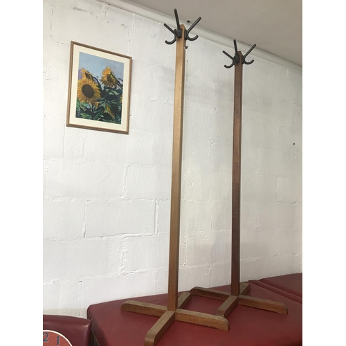 89 - Two solid wood coat stands, in a retro style (A/F as one hook missing)