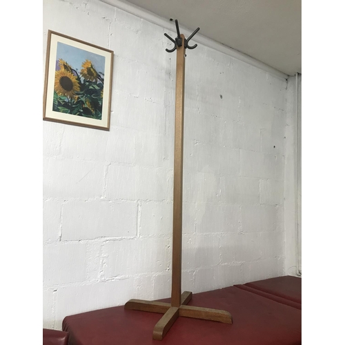 89 - Two solid wood coat stands, in a retro style (A/F as one hook missing)