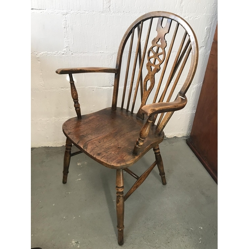 90 - A solid oak drop leaf gate leg table and x4 Windsor style wheelback chairs (of which 2 are carvers),... 