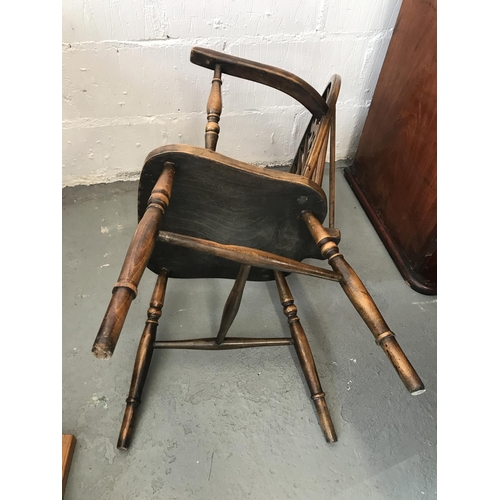 90 - A solid oak drop leaf gate leg table and x4 Windsor style wheelback chairs (of which 2 are carvers),... 