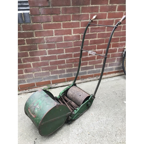 1 - A Ransomes push mower with grass box and wooden handles, stamped plaque reads Anglia 10