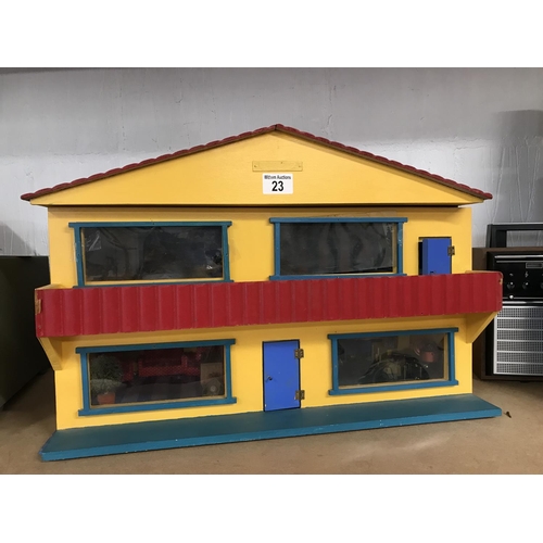 23 - A chalet style dolls house with lift off frontage and bespoke furniture