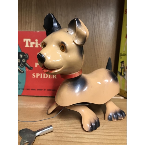 27 - 1950's Tri-ang clockwork Minic Puppy and Spider with original box and tinplate clockwork cat with bo... 