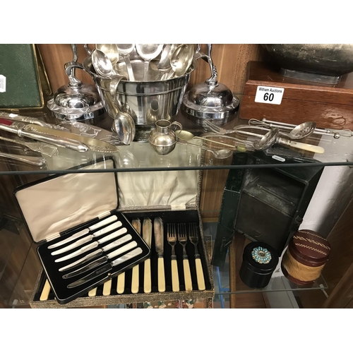 60 - A quantity of silver plate items including retro cash tin, boxed cutlery and butter knives with moth... 