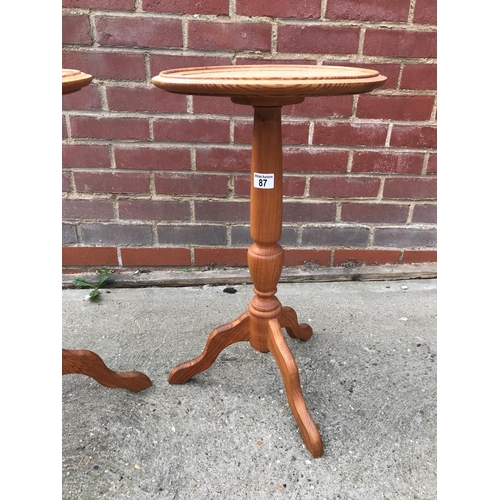 87 - A pair of bespoke wooden wine tables / plant stands with tripod leg design, approx height 65cm