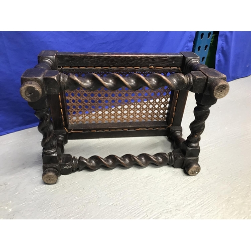 96 - A wooden footstool with barley twist and wicker seat