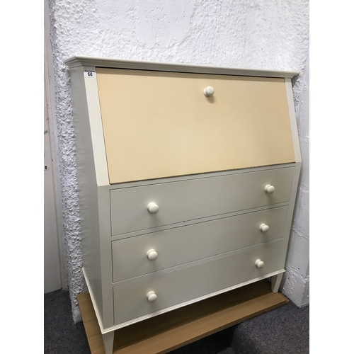 68 - A bureau with pull down front with inner shelf and three drawers, with label to back Jan Cavelle Fur... 