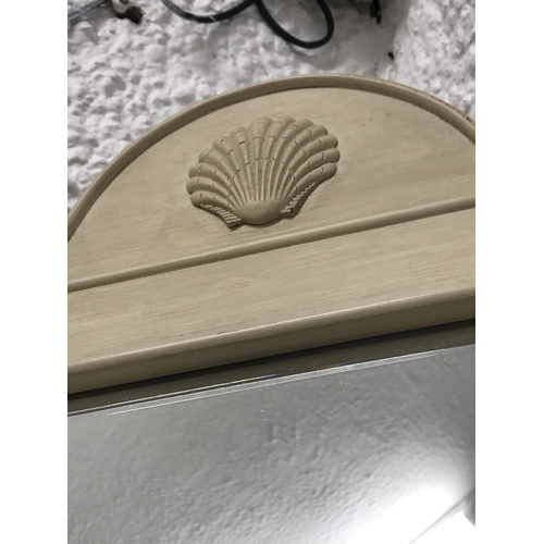 71 - Bevelled mirror in cream shabby chic paint effect with shell motif in washed pine effect together wi... 