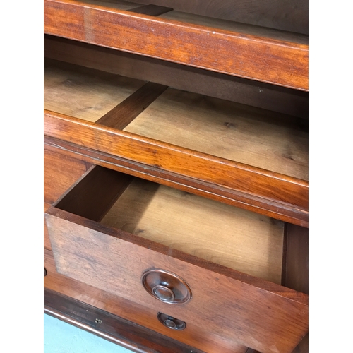 76 - Antique mahogany triple wardrobe linen press compactum. The triple wardrobe being raised on a plinth... 