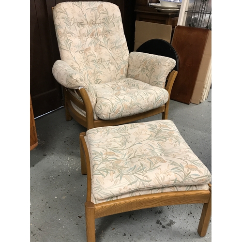 105 - Ercol single armchair plus footstool, jubilee style.