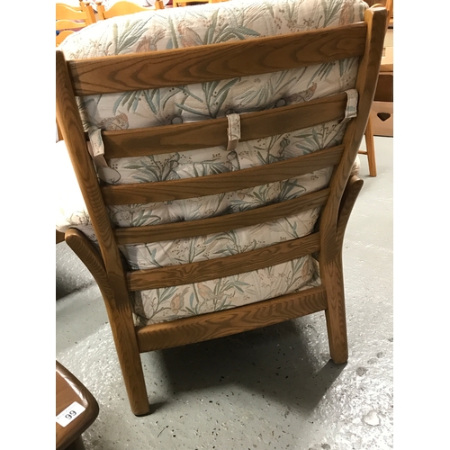 105 - Ercol single armchair plus footstool, jubilee style.