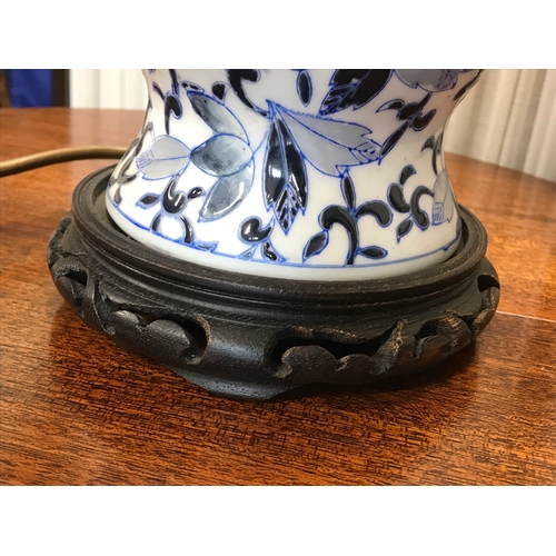 113 - Blue and white Chinese ginger jar lamp on wooden plinth, decorated with butterflies and fauna, PAT t... 