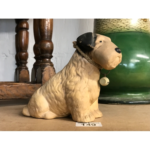 149 - A retro Air dale /Scottish terrier in the style of Sylvac with Watneys collar. Approx. H15cm