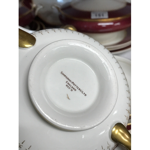 151 - A quantity of vintage Simpsons (Potters) Ltd, plate ware items in maroon with gilt design including ... 