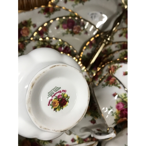 152 - Wicker basket containing Royal Albert Old Country Roses, six cups and saucers, six side plates, a sa... 