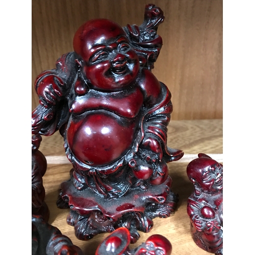 175 - Five Resin laughing Buddha ornaments in various sizes