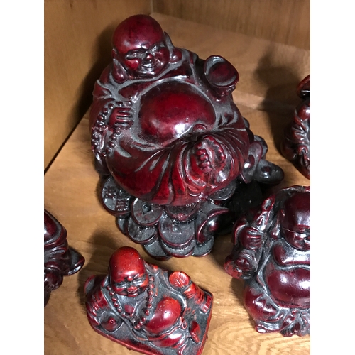 176 - Resin laughing Buddha ornaments in various designs and sizes, five in total