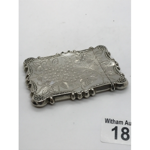 185 - A silver card case with engraving and foliate engraving to front and reverse of case