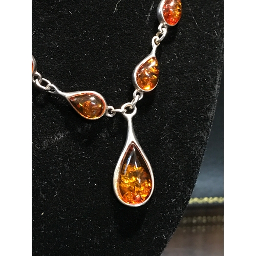 199 - A silver and amber drop necklace stamped 925, in gift/presentation box