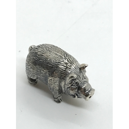 217 - A silver figure of a pig stamped sterling