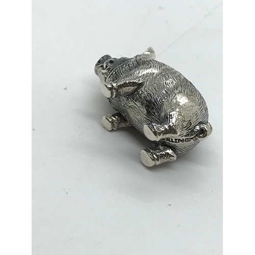 217 - A silver figure of a pig stamped sterling