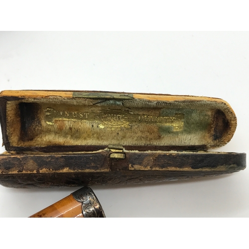 222 - Antique cheroot with silver trim engrave pattern detailing W H Carrington & Co hallmarked Chester c.... 