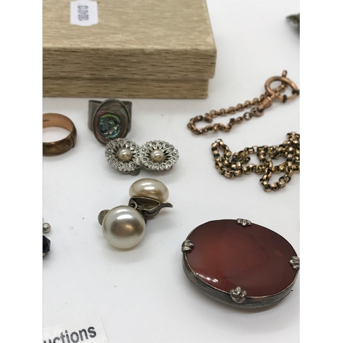 224 - Vintage jewellery including brooches, necklace, a silver napkin badge hallmarked Birmingham, silver ... 