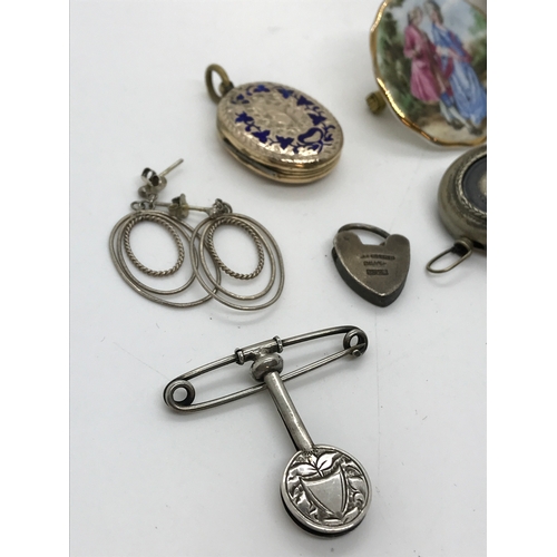 224 - Vintage jewellery including brooches, necklace, a silver napkin badge hallmarked Birmingham, silver ... 