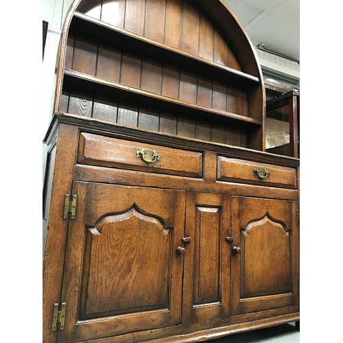 93 - A custom designed piece by Titchmarsh & Goodwin 20th century oak dresser (in two sections)