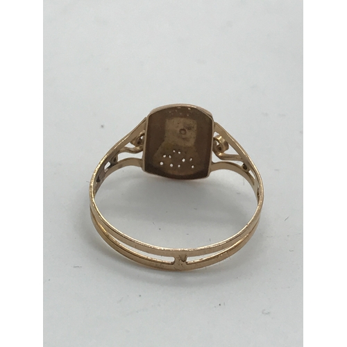 225 - Antique gold ring with scroll detailing to mount, central focal seed pearl, unmarked testing 18ct go... 