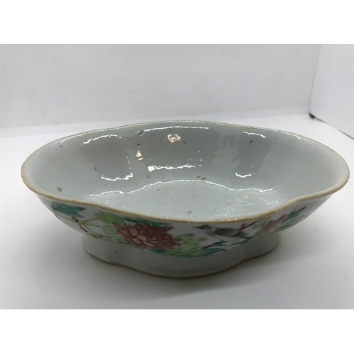 171 - An antique Chinese porcelain bowl, predominately oval shaped. Flower, fauna and bird decoration to f... 