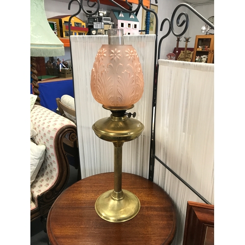 111b - A vintage twin wick fuel Duplex lamp with brass coloured base, glass funnel & floral frosted glass s... 