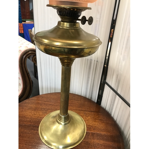 111b - A vintage twin wick fuel Duplex lamp with brass coloured base, glass funnel & floral frosted glass s... 