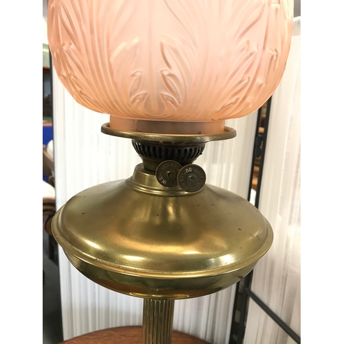 111b - A vintage twin wick fuel Duplex lamp with brass coloured base, glass funnel & floral frosted glass s... 