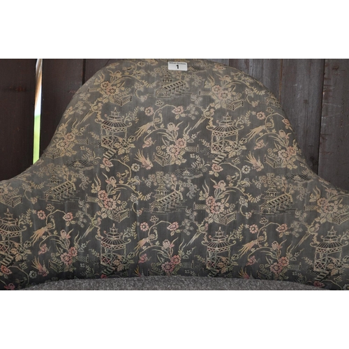 1 - A small Victorian castored chair/sofa with oriental design to fabric