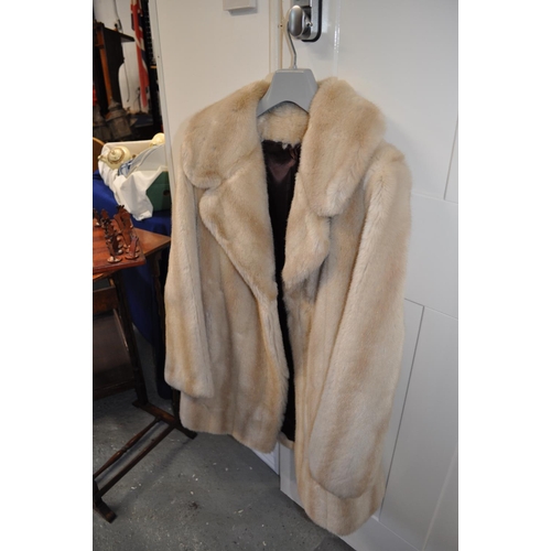 103 - Ladies cream faux fur coat, approx chest measurements 20