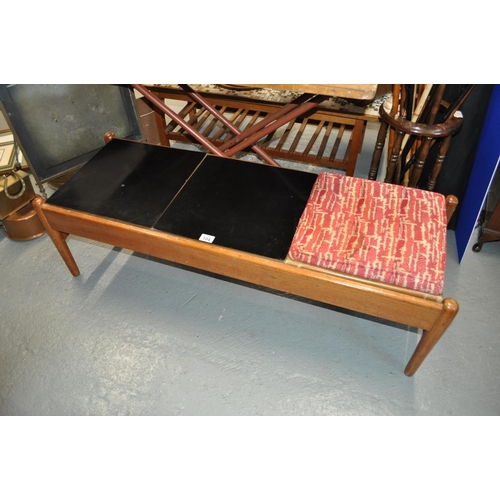 104 - A retro reversible table/seat/footrest