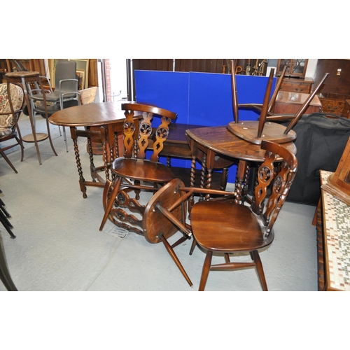 112 - A furniture bundle consisting; Four retro Ercol fleur de lys elm chairs,  Ercol two tier table with ... 