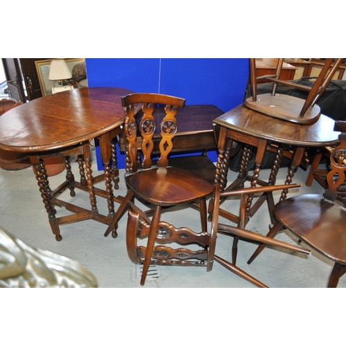 112 - A furniture bundle consisting; Four retro Ercol fleur de lys elm chairs,  Ercol two tier table with ... 