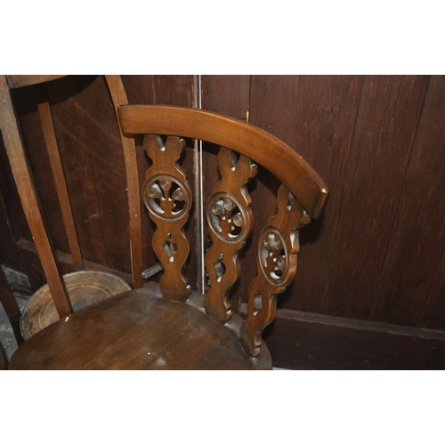 116 - A two -tier plant stand and two Ercol Fleur de Lys chairs