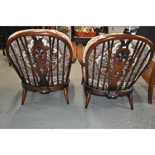 118 - Two Ercol fireside chairs with cushions