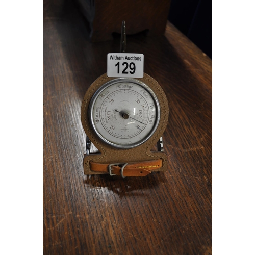 129 - A novelty desk Barometer with cowboy spur, marked Shortlands SB