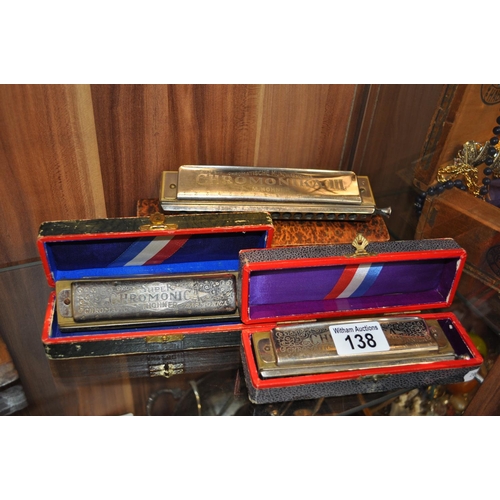 138 - Three Hohner harmonicas in boxes, including a Chromonika III model