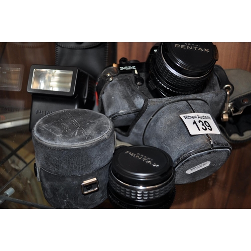 139 - Pentax MX Ashai camera with 50mm lens, Asahi 35mm lens and AF-200s flash