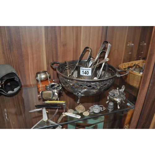 140 - A selection of silver and silver plate item including medallions, penknives, vesta cases, salts, ton... 