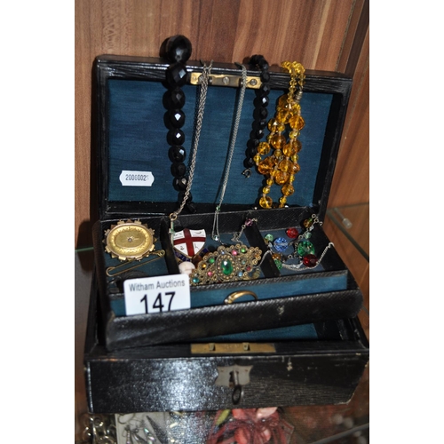 147 - A jewellery box (with key) containing antique and vintage jewellery items including gold and silver