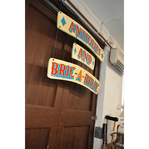 161 - Wooden 'Antiques and Bric a Brac' fairground style hanging sign on chains together with two other ha... 