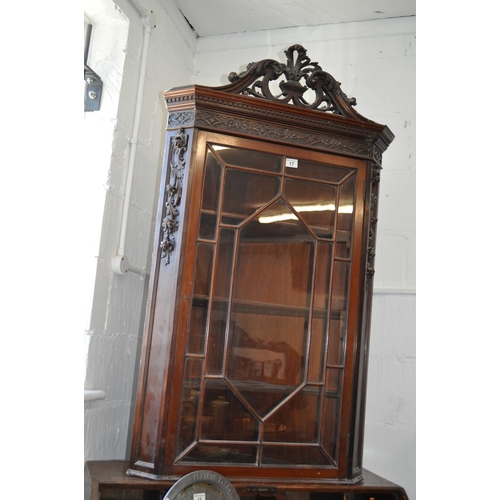 17 - A decorative vintage corner cabinet with glazed door and key, measuring approx H130cm