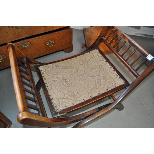 22 - Antique folding piano chair in a campaign style with patent label to underside