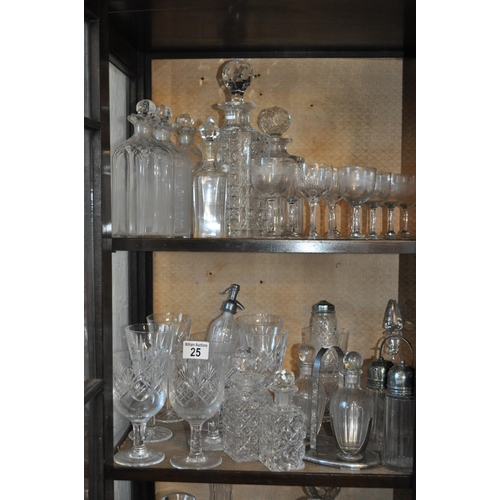 25 - A selection of decanters/bottles with stoppers and other glassware items together with Pall Mall she... 